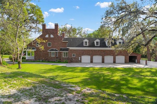 Attached, Backyard, Exterior, Facade, Brick Facade, Cape Cod
