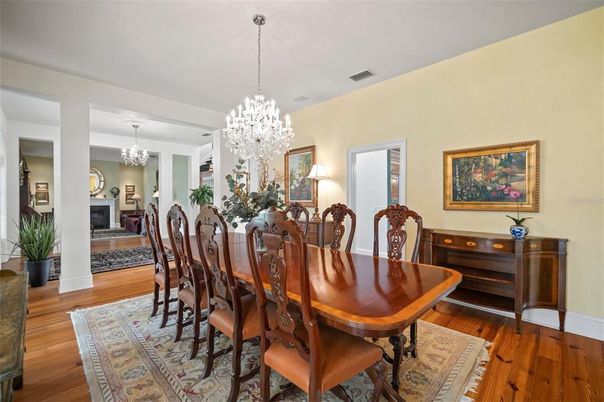Chandelier, Dining room, Fireplace, Interior, Wood Texture Flooring