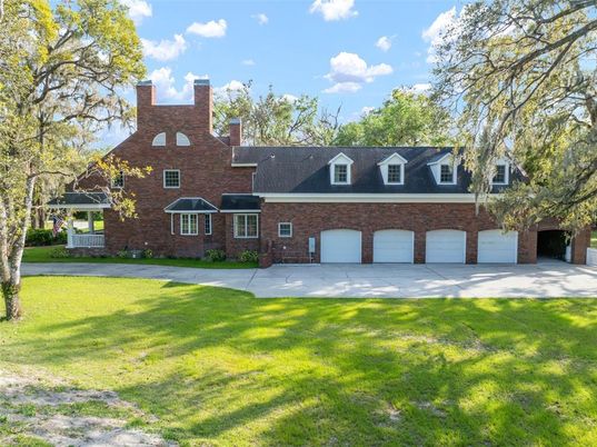 Attached, Backyard, Exterior, Facade, Brick Facade, Cape Cod