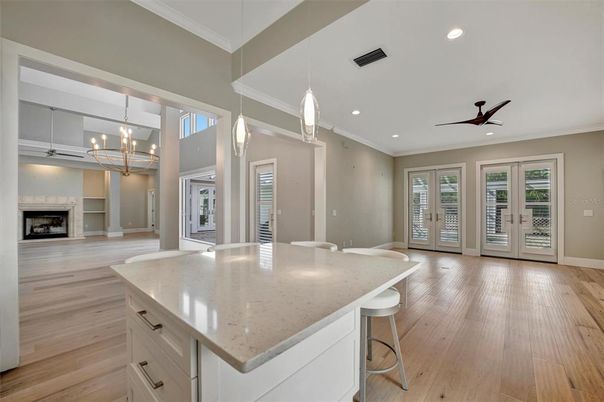 Fireplace, Interior, Kitchen, Pendant Lights, Recessed Lighting, Wood Texture Flooring