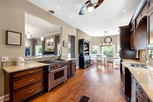Dining room, Interior, Kitchen, Pendant Lights, Recessed Lighting, Stainless Steel Appliances, Wood Texture Flooring
