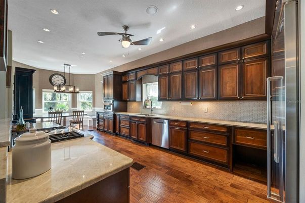 Dining room, Interior, Kitchen, Pendant Lights, Recessed Lighting, Stainless Steel Appliances, Wood Texture Flooring