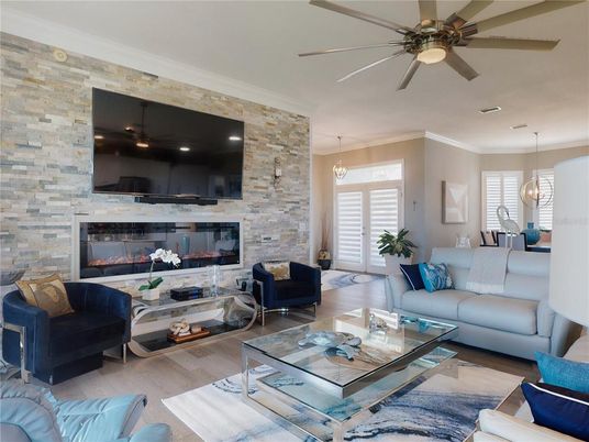 Dining room, Fireplace, Interior, Living room, Pendant Lights, Stone Walls, Wood Texture Flooring