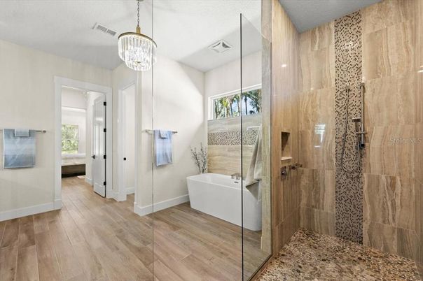 Bathroom, Chandelier, Free Standing Baths, Interior, Pendant Lights, Wood Texture Flooring