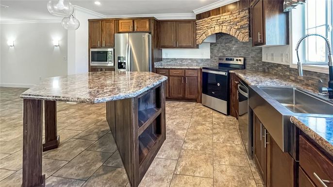 Interior, Kitchen, Recessed Lighting, Stainless Steel Appliances, Stone Walls
