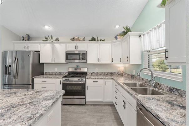 Interior, Kitchen, Recessed Lighting, Stainless Steel Appliances, Wood Texture Flooring
