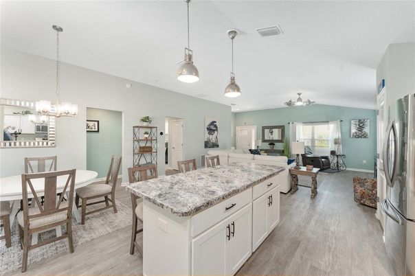 Chandelier, Dining room, Interior, Kitchen, Living room, Pendant Lights, Wood Texture Flooring