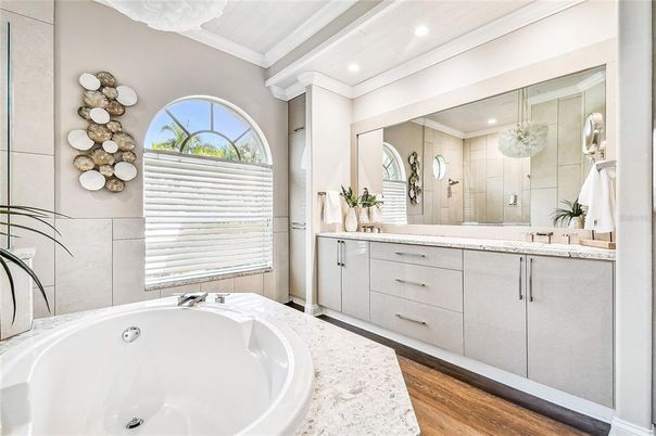 Bathroom, Dual Sink Vanities, Free Standing Baths, Interior, Recessed Lighting, Wood Texture Flooring