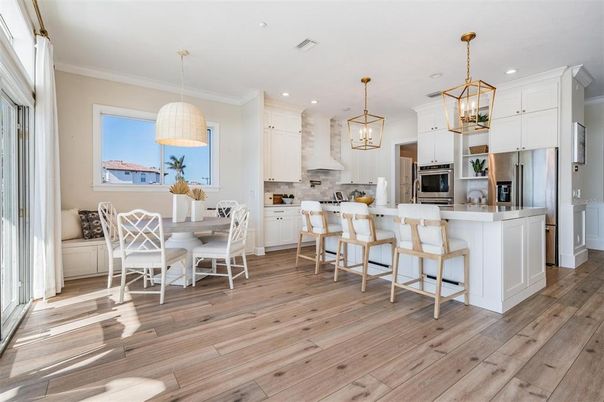 Dining room, Interior, Kitchen, Pendant Lights, Recessed Lighting, Stainless Steel Appliances, Wood Texture Flooring