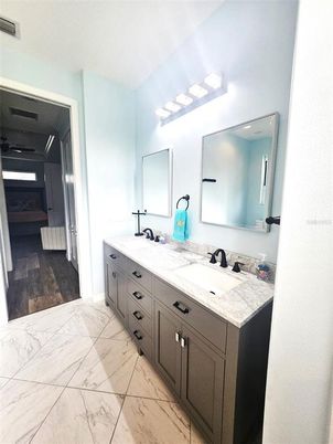Bathroom, Dual Sink Vanities, Interior, Marble, Wood Texture Flooring