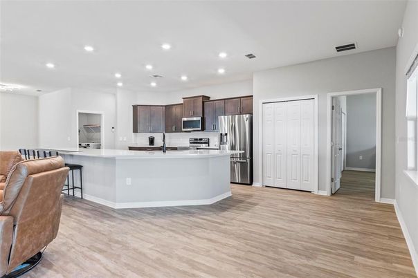 Interior, Kitchen, Recessed Lighting, Stainless Steel Appliances, Wood Texture Flooring