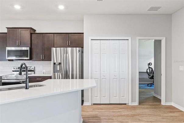 Interior, Kitchen, Recessed Lighting, Stainless Steel Appliances, Wood Texture Flooring