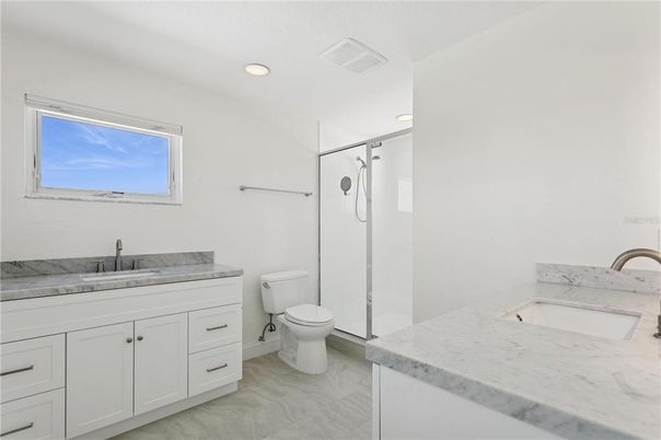 Bathroom, Dual Sink Vanities, Glass Shower, Interior, Recessed Lighting