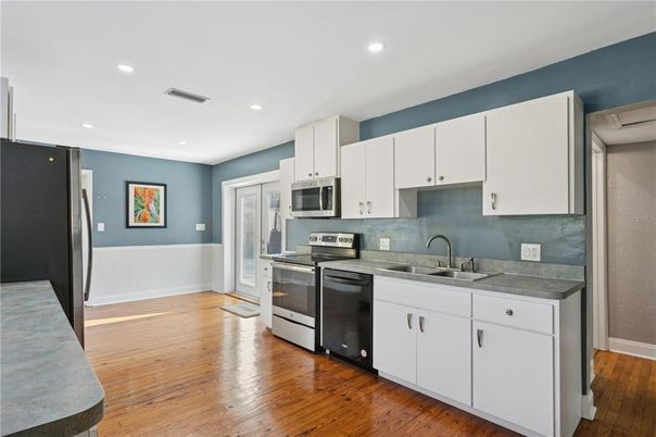 Interior, Kitchen, Recessed Lighting, Stainless Steel Appliances, Wood Texture Flooring