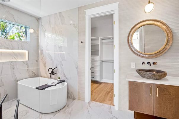 Bathroom, Dual Sink Vanities, Free Standing Baths, Interior, Marble, Marble Walls, Walk-in Closets, Wood Texture Flooring