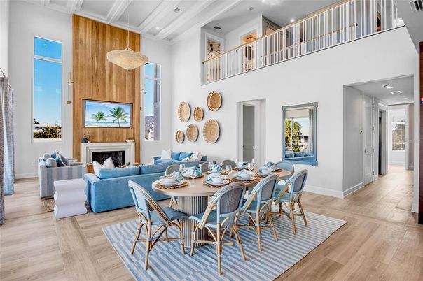 Dining room, Fireplace, Interior, Living room, Recessed Lighting, Wood Texture Flooring, Wooden Walls