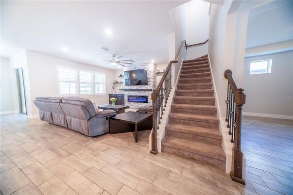Fireplace, Interior, Living room, Recessed Lighting, Wood Texture Flooring