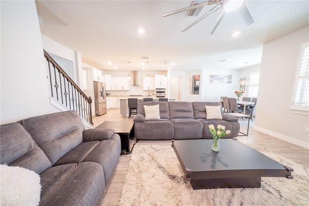 Dining room, Interior, Kitchen, Living room, Pendant Lights, Recessed Lighting, Stainless Steel Appliances, Wood Texture Flooring