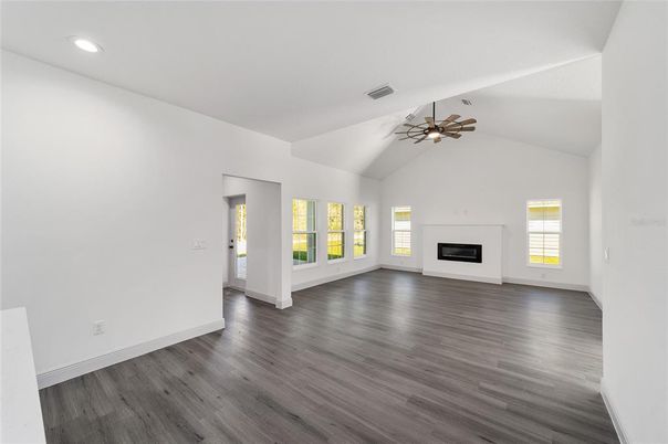 Empty room, Fireplace, Interior, Pendant Lights, Recessed Lighting, Wood Texture Flooring