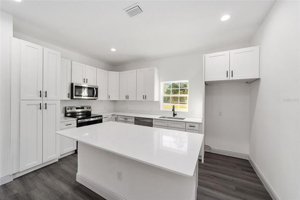 Interior, Kitchen, Recessed Lighting, Stainless Steel Appliances, Wood Texture Flooring