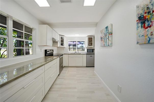 Interior, Kitchen, Recessed Lighting, Stainless Steel Appliances, Wood Texture Flooring