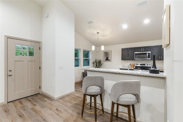 Interior, Kitchen, Pendant Lights, Recessed Lighting, Stainless Steel Appliances, Wood Texture Flooring