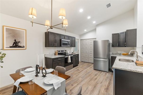 Dining room, Interior, Kitchen, Recessed Lighting, Stainless Steel Appliances, Wood Texture Flooring