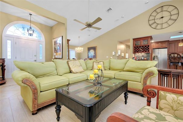 Chandelier, Dining room, Interior, Kitchen, Living room, Pendant Lights, Stainless Steel Appliances, Wood Texture Flooring