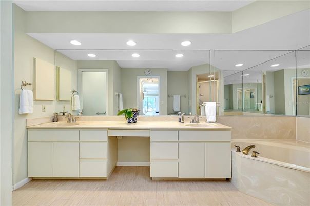 Bathroom, Dual Sink Vanities, Interior, Recessed Lighting, Wood Texture Flooring