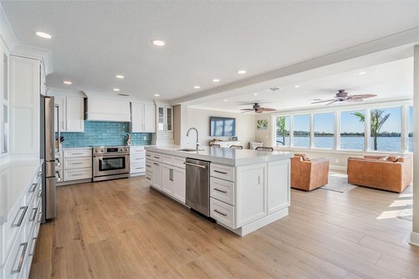 Interior, Kitchen, Recessed Lighting, Stainless Steel Appliances, Water, Wood Texture Flooring