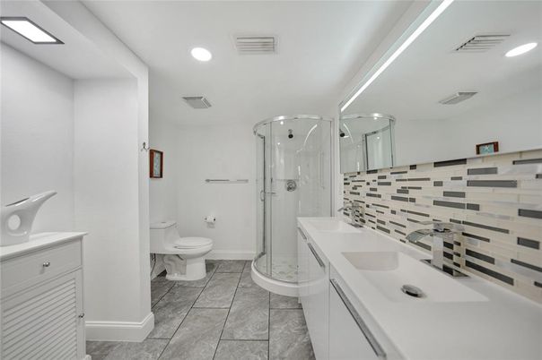 Bathroom, Dual Sink Vanities, Glass Shower, Interior, Recessed Lighting