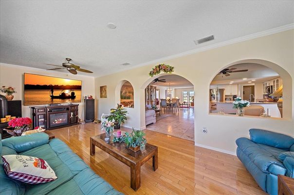 Dining room, Fireplace, Interior, Kitchen, Living room, Recessed Lighting, Wood Texture Flooring