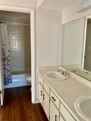 Bathroom, Dual Sink Vanities, Interior, Tile Countertops, Wood Texture Flooring