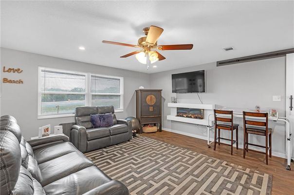 Fireplace, Interior, Living room, Recessed Lighting, Wood Texture Flooring