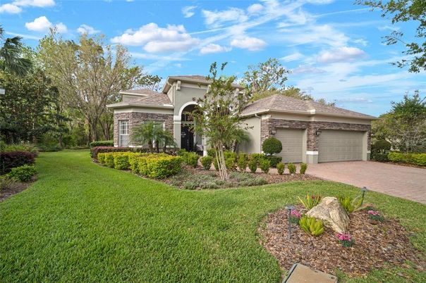 Attached, Backyard, Exterior, Facade, Brick Facade, Mediterranean