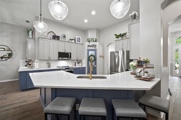 Interior, Kitchen, Pendant Lights, Recessed Lighting, Stainless Steel Appliances, Wood Texture Flooring
