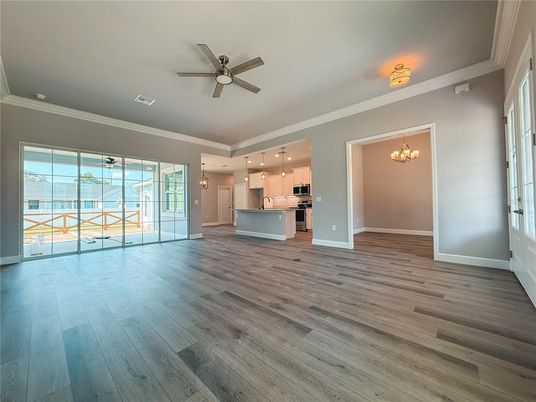 Chandelier, Empty room, Interior, Kitchen, Pendant Lights, Stainless Steel Appliances, Wood Texture Flooring