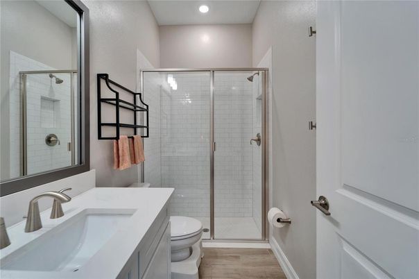 Bathroom, Glass Shower, Interior, Recessed Lighting, Wood Texture Flooring