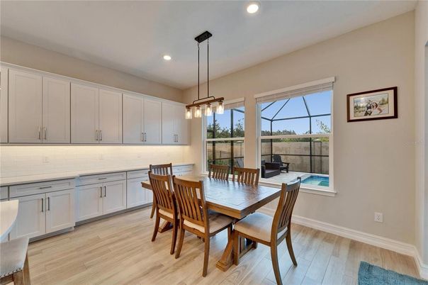 Dining room, Interior, Pendant Lights, Recessed Lighting, Wood Texture Flooring