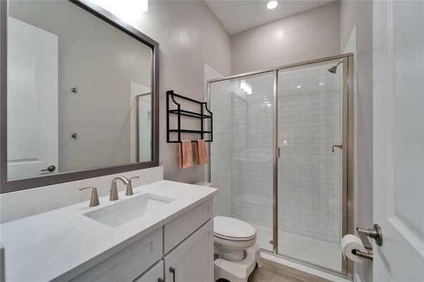Bathroom, Glass Shower, Interior, Recessed Lighting, Wood Texture Flooring