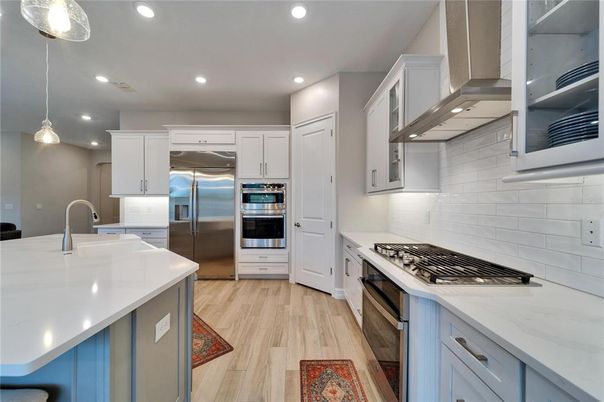 Interior, Kitchen, Pendant Lights, Recessed Lighting, Stainless Steel Appliances, Wood Texture Flooring