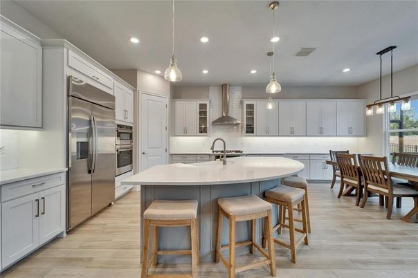 Interior, Kitchen, Pendant Lights, Recessed Lighting, Stainless Steel Appliances, Wood Texture Flooring