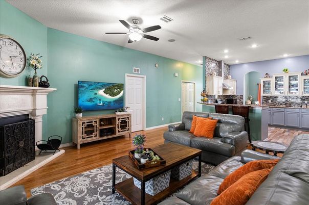 Fireplace, Interior, Living room, Recessed Lighting, Wood Texture Flooring