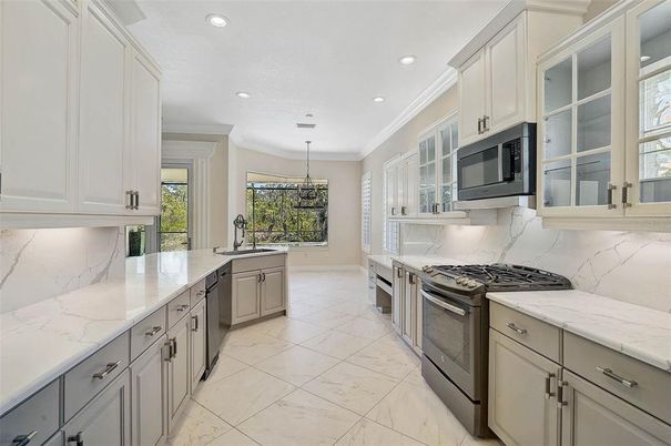 Chandelier, Interior, Kitchen, Marble, Marble Walls, Recessed Lighting, Stainless Steel Appliances