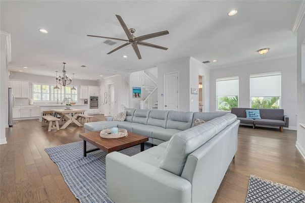 Chandelier, Dining room, Interior, Kitchen, Living room, Pendant Lights, Recessed Lighting, Wood Texture Flooring