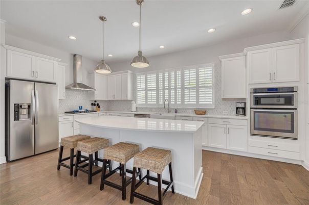 Interior, Kitchen, Pendant Lights, Recessed Lighting, Stainless Steel Appliances, Wood Texture Flooring