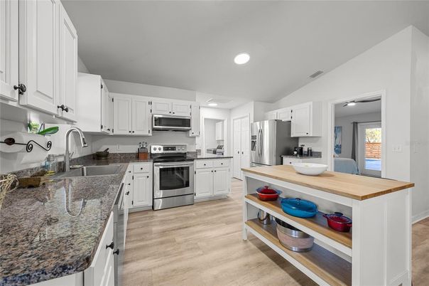 Interior, Kitchen, Recessed Lighting, Stainless Steel Appliances, Wood Texture Flooring