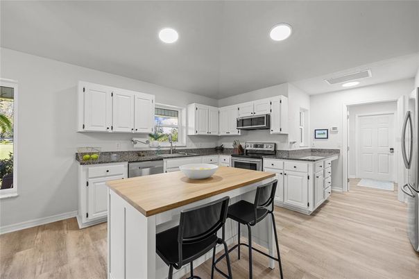 Interior, Kitchen, Recessed Lighting, Stainless Steel Appliances, Wood Texture Flooring