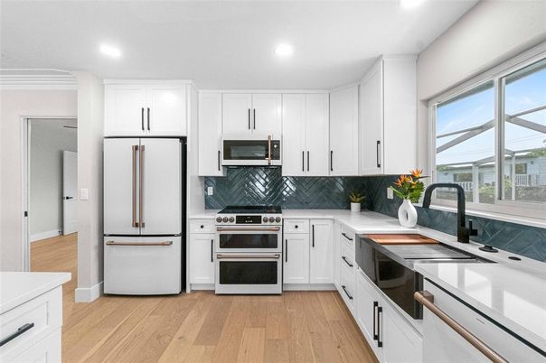 Interior, Kitchen, Recessed Lighting, Stainless Steel Appliances, Wood Texture Flooring