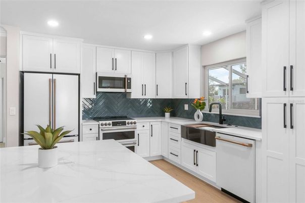 Interior, Kitchen, Recessed Lighting, Stainless Steel Appliances, Wood Texture Flooring